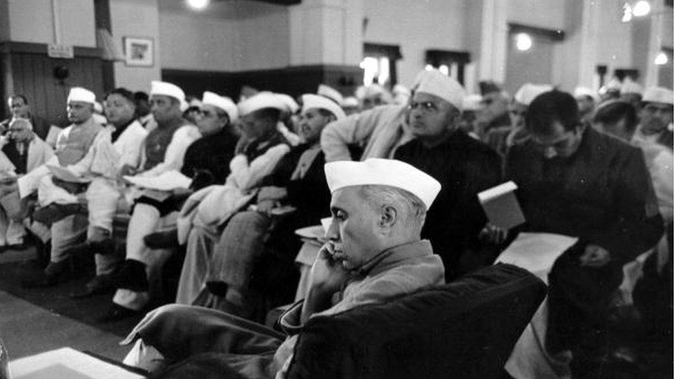 Indian statesman Jawaharial (Pandit) Nehru (1889 - 1964) attending the Constituent Assembly meeting at the Council House Library, New Delhi, to frame a constitution for Independent India. Original Publication: