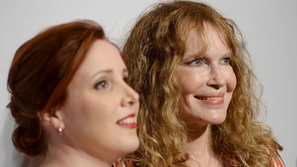 Dylan Farrow with mother Mia