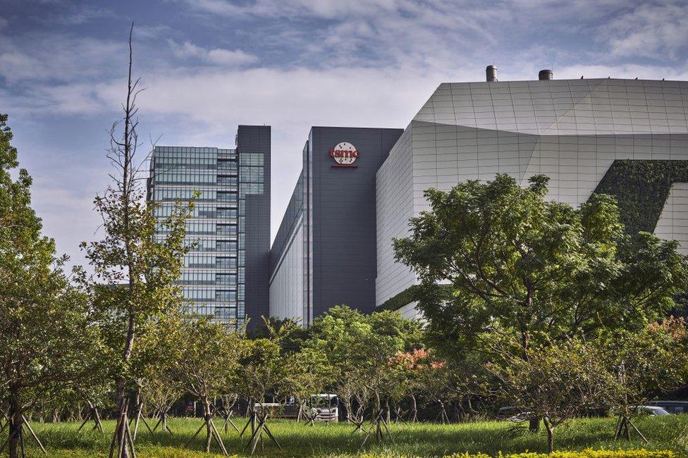 The Taiwan Semiconductor Manufacturing Co. logo atop a building at the Hsinchu Science Park in Hsinchu, Taiwan, on Tuesday, Oct. 17, 2023