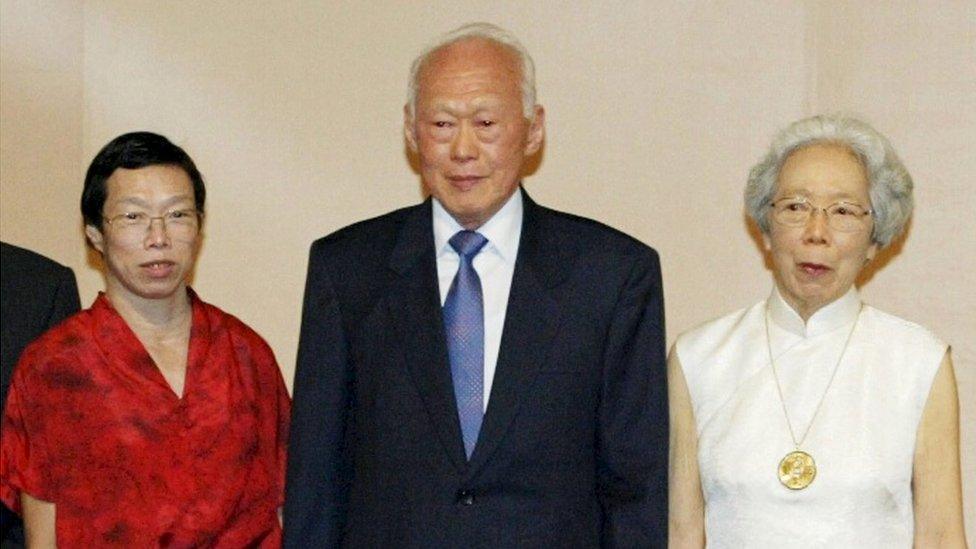 Former prime minister Lee Kuan Yew (2nd L) and his family celebrate his 80th birthday in Singapore in this 16 September 2003 file photo