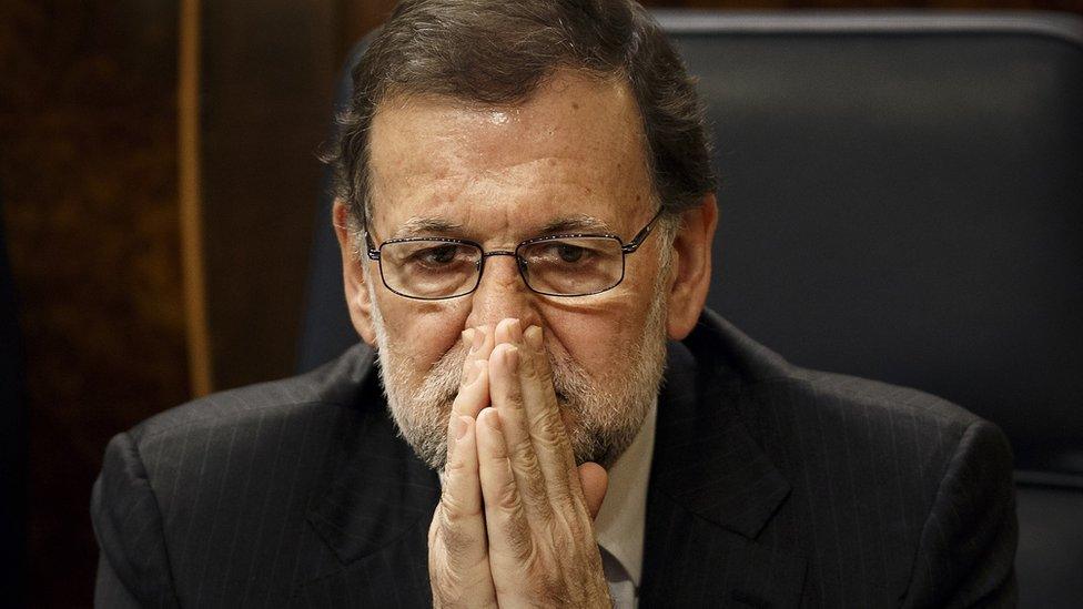 Spain"s Prime Minister Mariano Rajoy sits in parliament