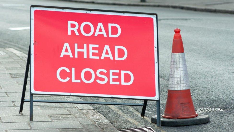 Road closed sign