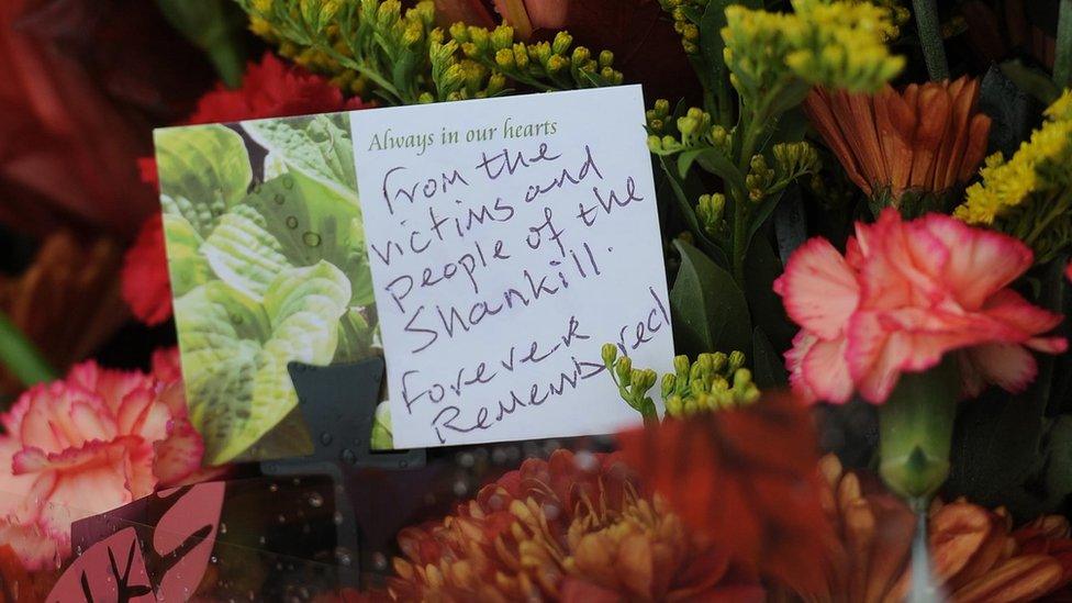 Flowers left at the memorial in Greysteel on the 20th Anniversary of the shooting from the people of the Shankill Road.