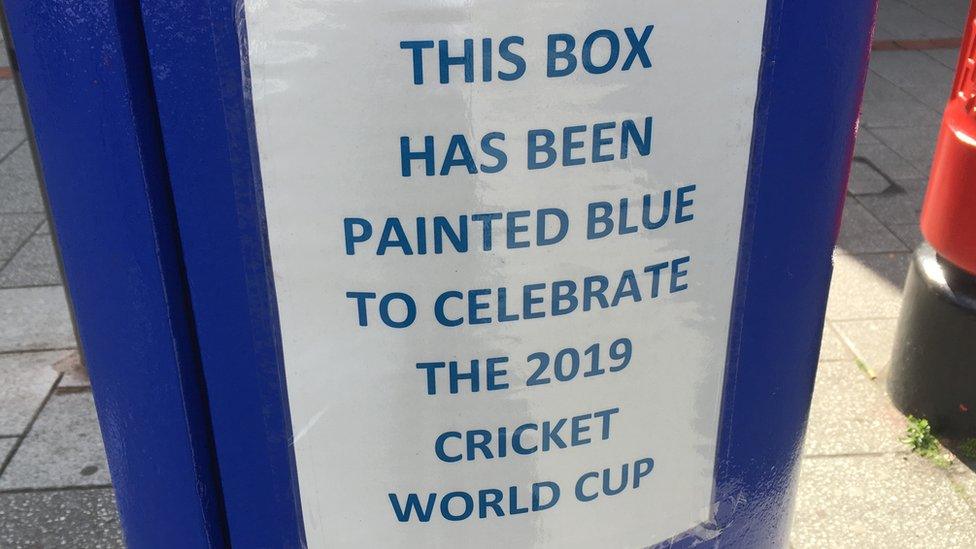 Blue post box sign