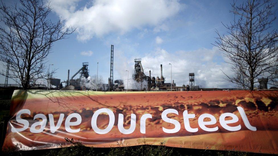 A banner declaring 'Save our Steel' is erected outside the Tata Steel plant at Port Talbot on March 30, 2016 in Port Talbot, Wales