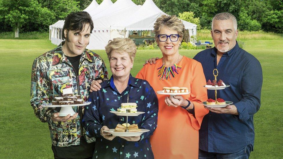 Noel Fielding, Sandi Toksvig, Prue Leith and Paul Hollywood stand outside the Bake Off tent