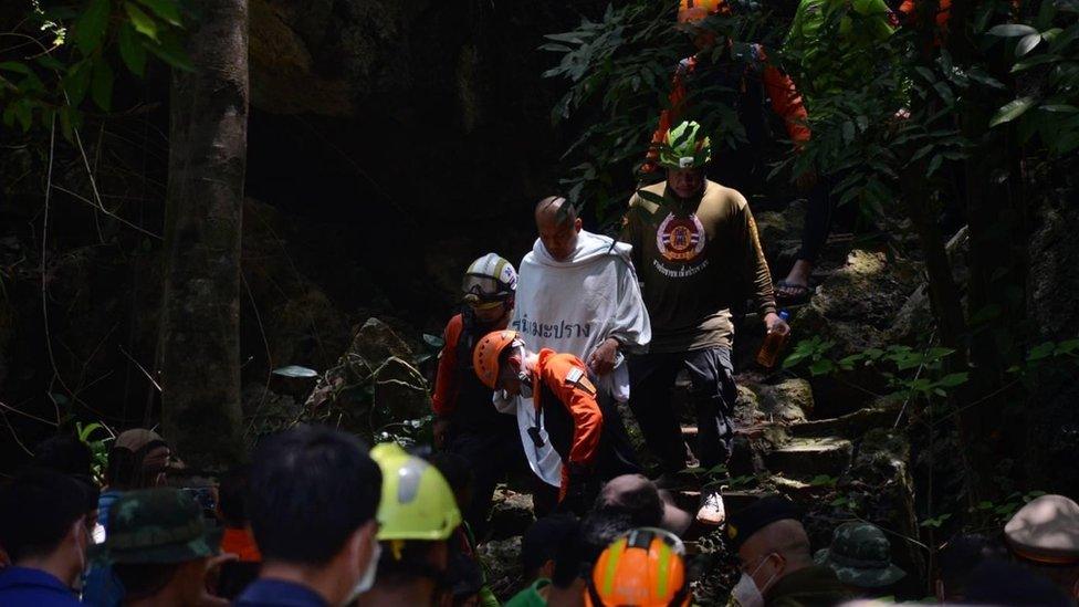 Monk is brought out safely from a cave