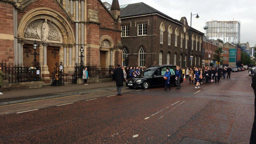 Mourners entering St Patrick's Church on Donegall Street