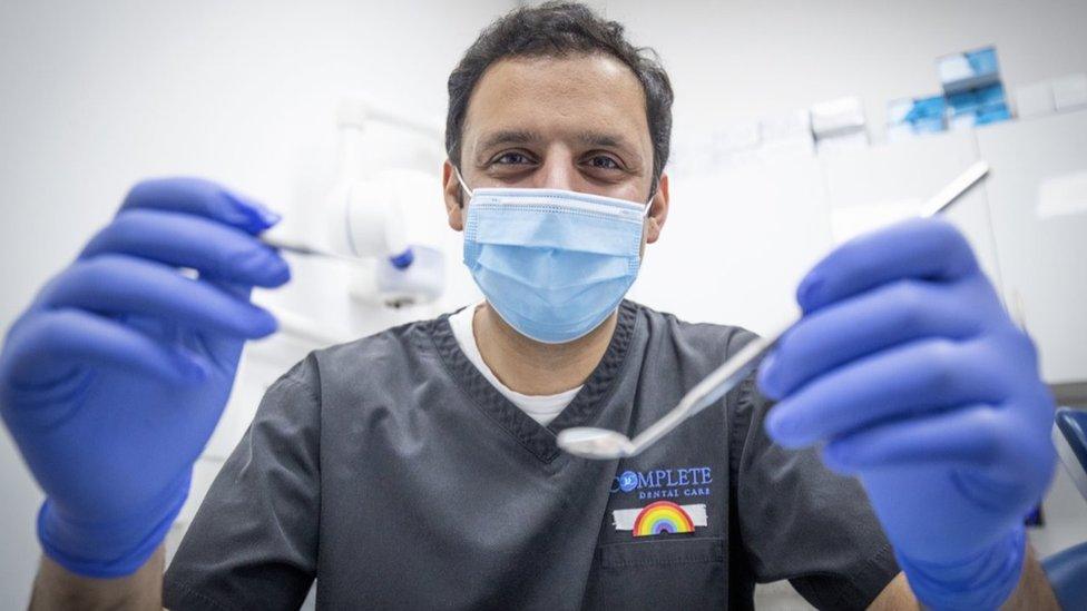 Scottish Labour leader Anas Sarwar, who began his working life for the NHS as a dentist, during a visit to the Complete Dental Care surgery in Glasgow ahead of the first Scottish party leaders' debate to discuss Labour's plan for an NHS recovery. Picture date: Tuesday March 30, 2021.