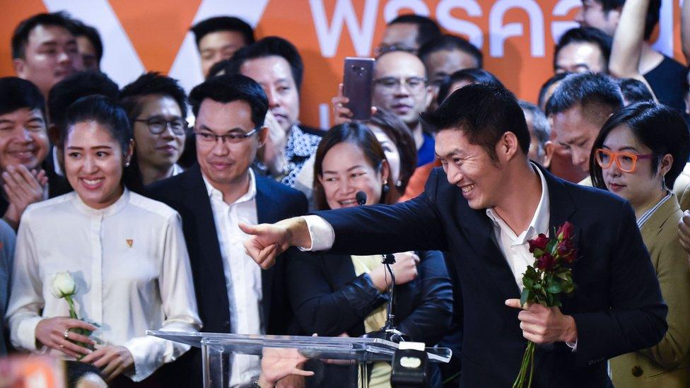 Thanathorn Juangroongruangkit, leader of the opposition Future Forward party, gestures as he speaks at the party's headquarters in Bangkok