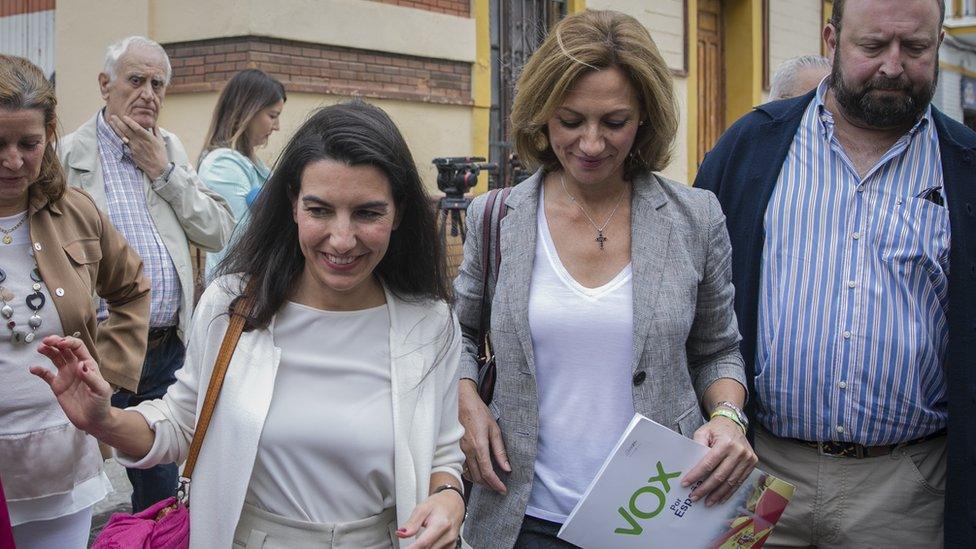 The president of Vox in Madrid, Rocio Monasterio (1L), is seen after talking to the press at the entrance door of Mena Center on November 04, 2019 in Seville, Spain.