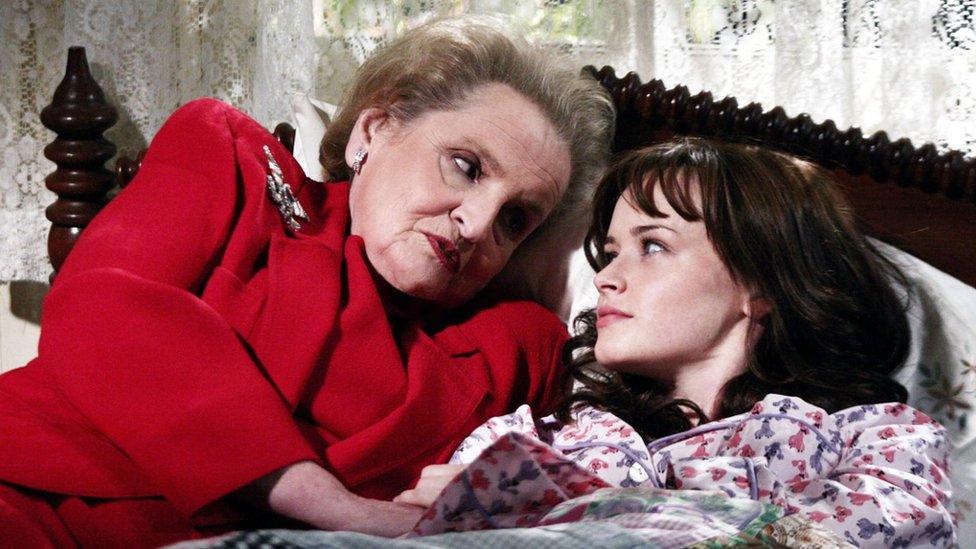 Madeleine Albright is seen in 2005 episode of Gilmore Girls, in bed with Rory as part of a dream sequence