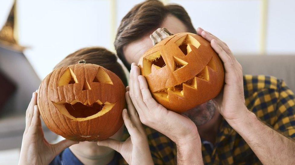 son-and-dad-with-pumpkins.