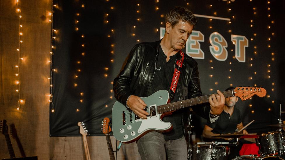 Andy Mooney playing a Fender Telecaster guitar