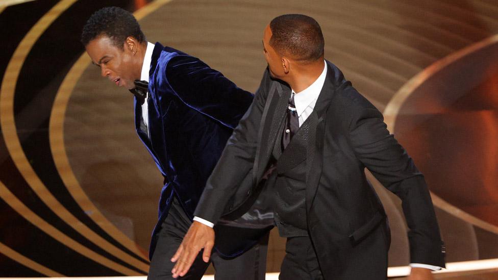 Will Smith slaps Chris Rock on stage at the Oscars