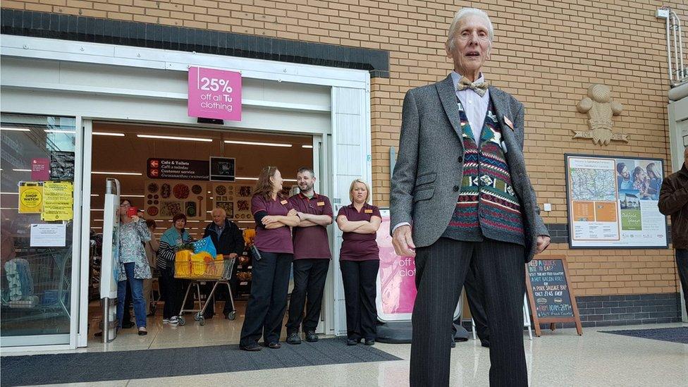 Reg Buttress standing outside of Cwmbran Sainsbury's