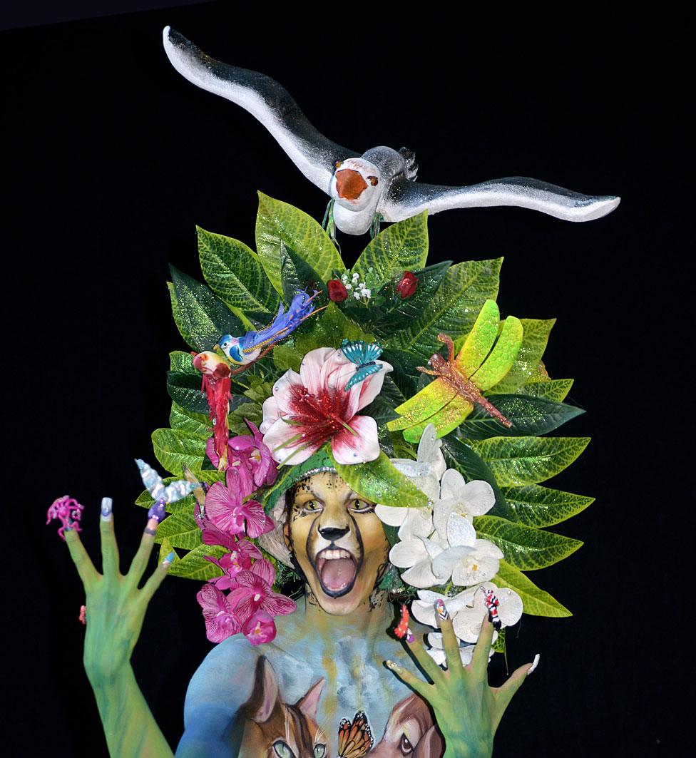 A model poses for a picture at the 21st World Bodypainting Festival 2018