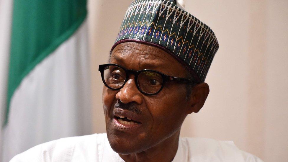 In this file photo taken on August 31, 2018 Nigerian President Muhammadu Buhari speaks during a joint press conference with the German chancellor at the presidency in Abuja.