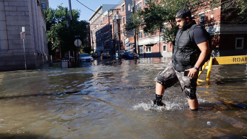 man-walking-through-water.