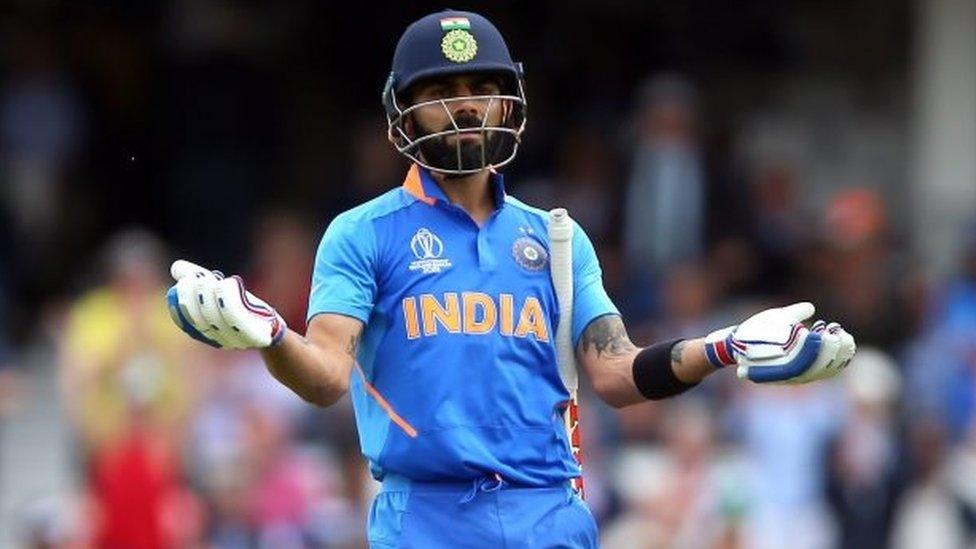 Virat Kohli gestures during the ICC Cricket World Cup group stage match at The Oval, London