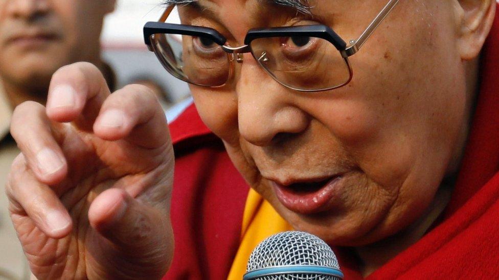 Tibetan spiritual leader, the Dalai Lama, speaks to students at a school in Mumbai, India, 8 December 2017