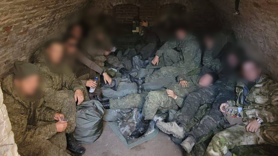 Russian troops in a basement