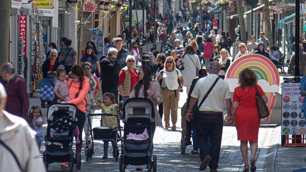 People wealking in street in Gibraltar