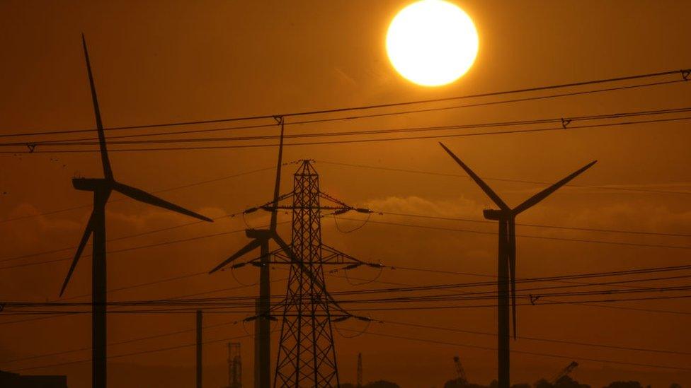 Wind turbine and pylons