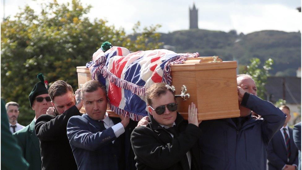 Brett Savage's coffin was carried through Newtownards on Friday