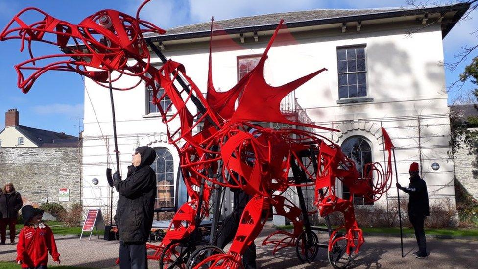 A metal dragon sculture at Cardigan castle