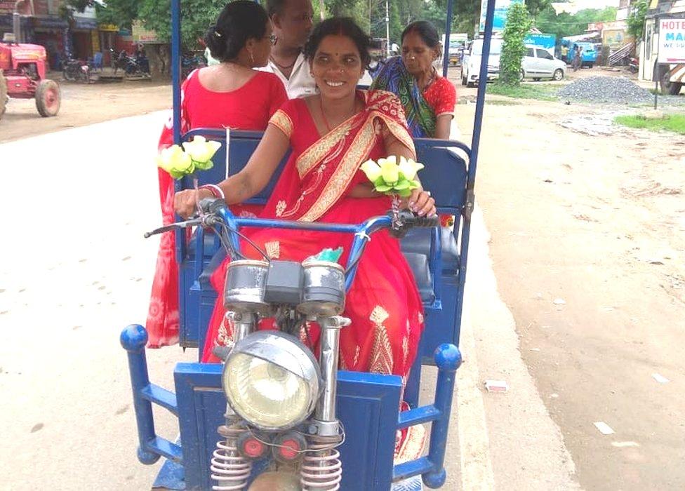 Sushila Devi and her e-rickshaw