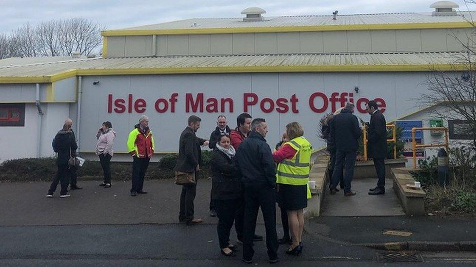 Postal staff outside the sorting office