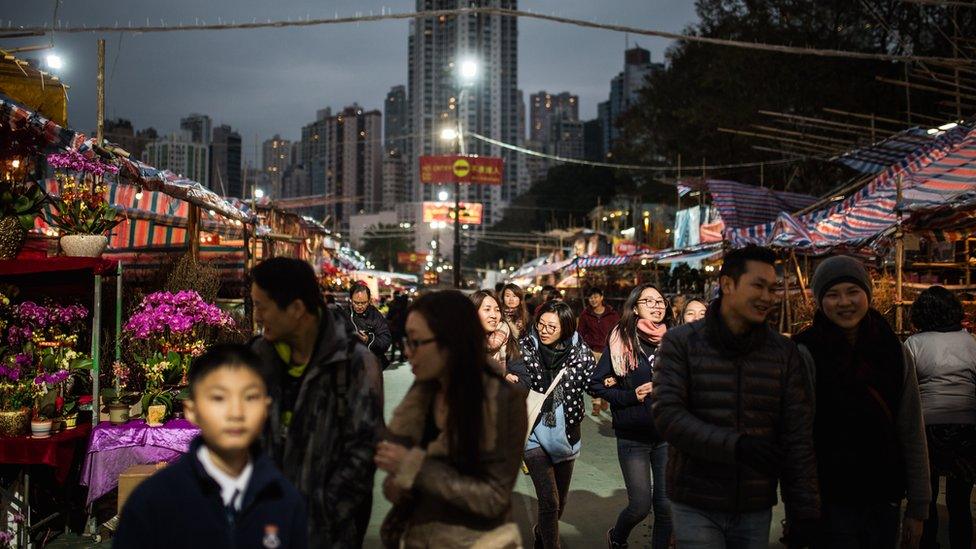 People visit the Victoria Park New Year Flower Market in Hong Kong on February 2, 2016