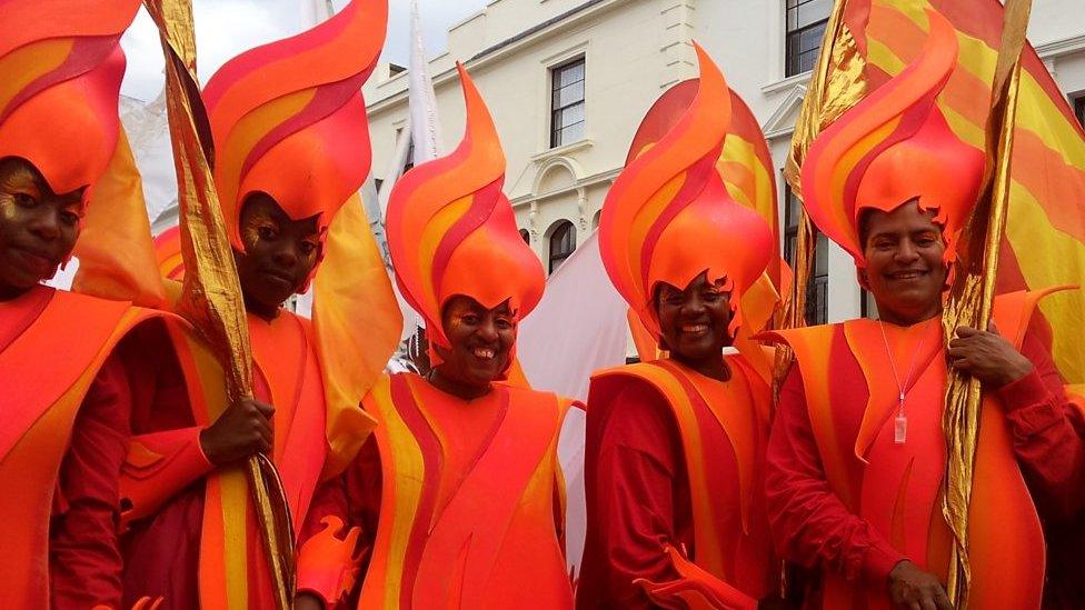 People in carnival costume