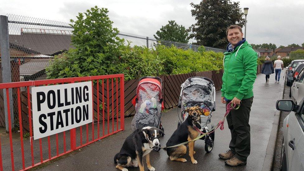 Screen grab of tweet by @Thefpl_vet of a man with two babies in strollers and two dogs