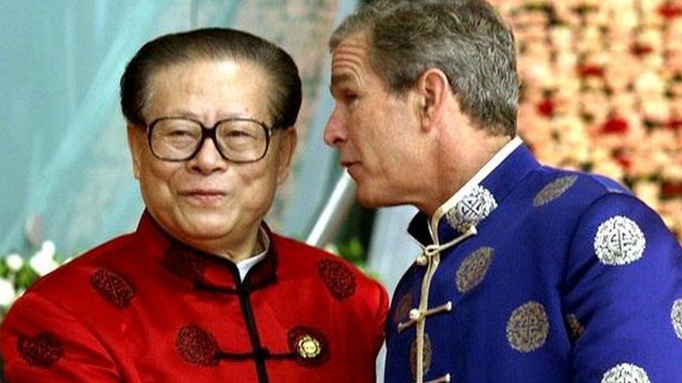 Bush, George W. shakes hands with Jiang Zemin at start of the leaders dialogue at the APEC summit in Shanghai