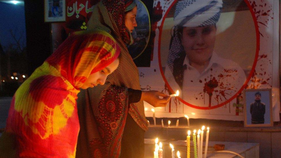 Members of Army Public School Shuhada Forum light candles in commemoration of martyrs of the tragic Army Public School shootings at Aman Chowk on April 16, 2015 in Peshawar, Pakistan.