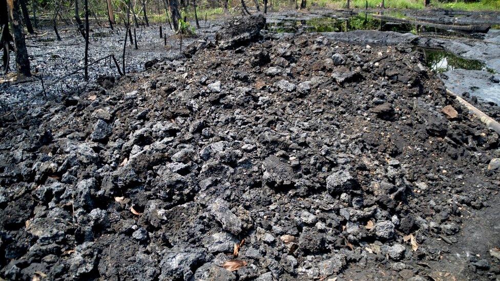 Burned ground at an oil refinery