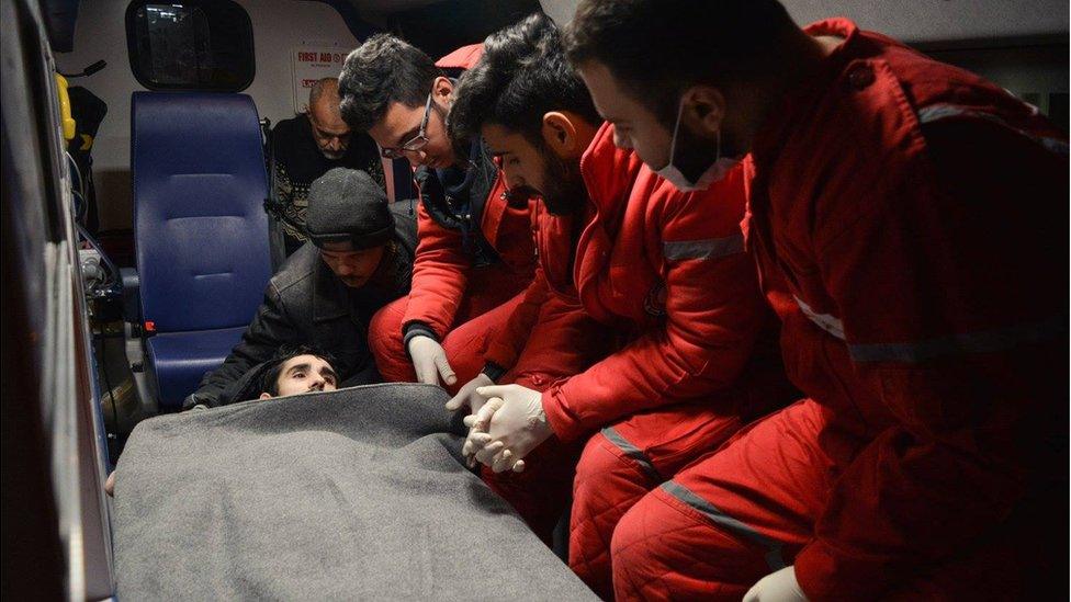 Man in ambulance, being taken out of eastern Aleppo by the Red Cross/Red Crescent on Wednesday 7 December 2016