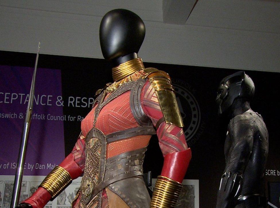 Two of the Black Panther costumes