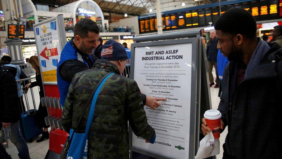 Passengers at London Victoria railway station