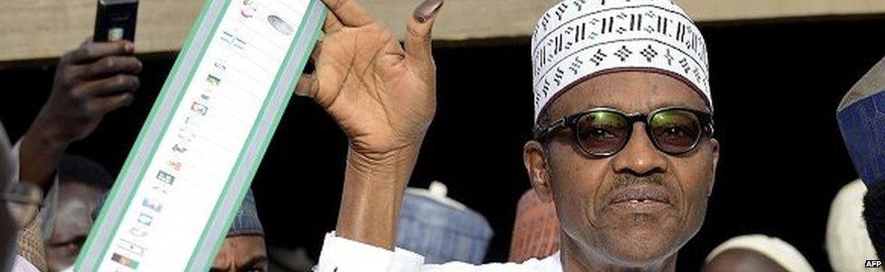 Muhammdu Buhari with a ballot paper in Nigeria on 28 March 2015