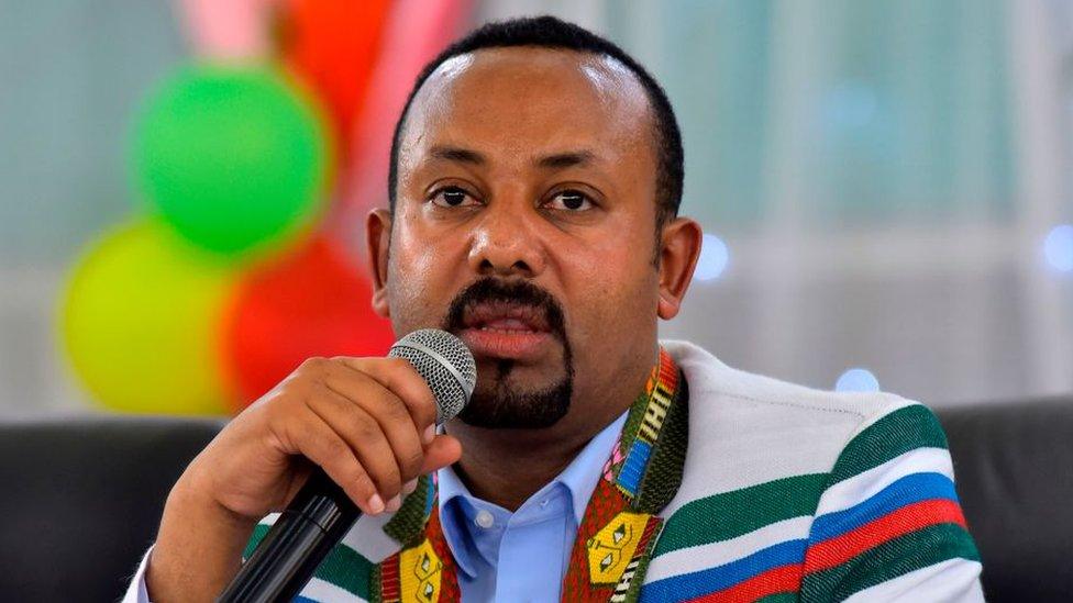 Ethiopian Prime Minister Abiy Ahmed, wearing a white coat bearing the traditional Kafficho colours of red, green and blue, address the crowd in Bonga, the main town in Kaffa province, some 449km south west of the capital Addis Ababa, on September 15, 2019