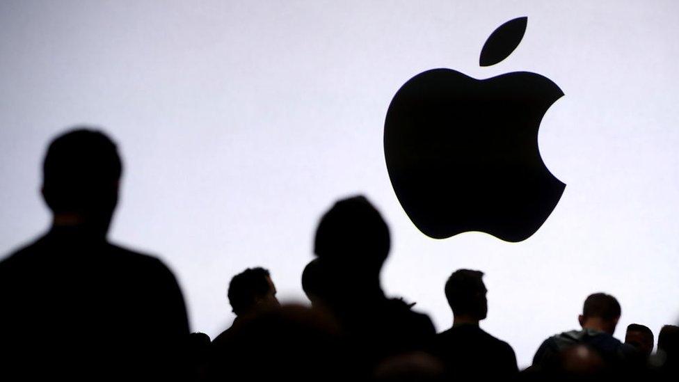 Attendees wait for the start of the 2017 Apple Worldwide Developer Conference (WWDC)