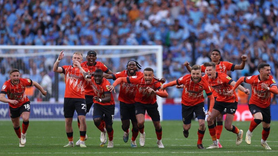 Luton Town players celebrate promotion