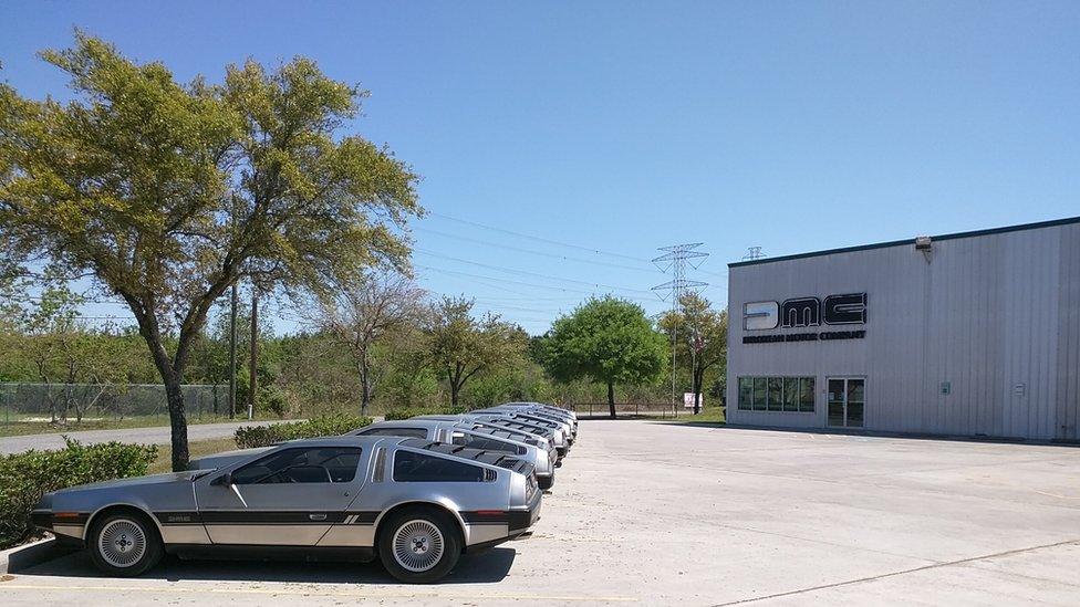 A line of DeLoreans outside the factory in Humble, Texas