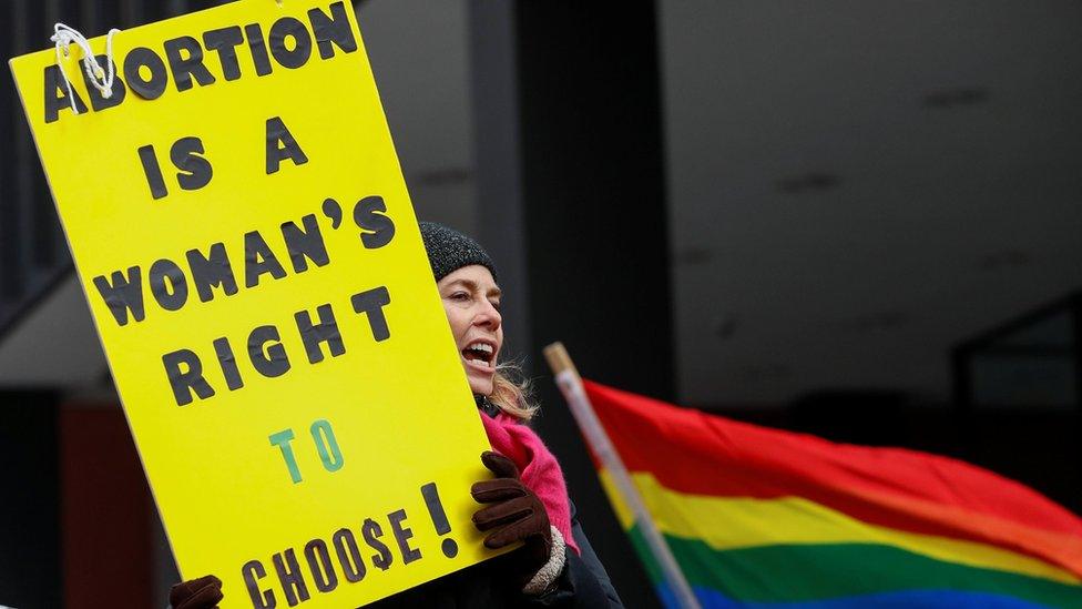 An abortion-rights campaigner in Chicago protesting after President Trump's election win