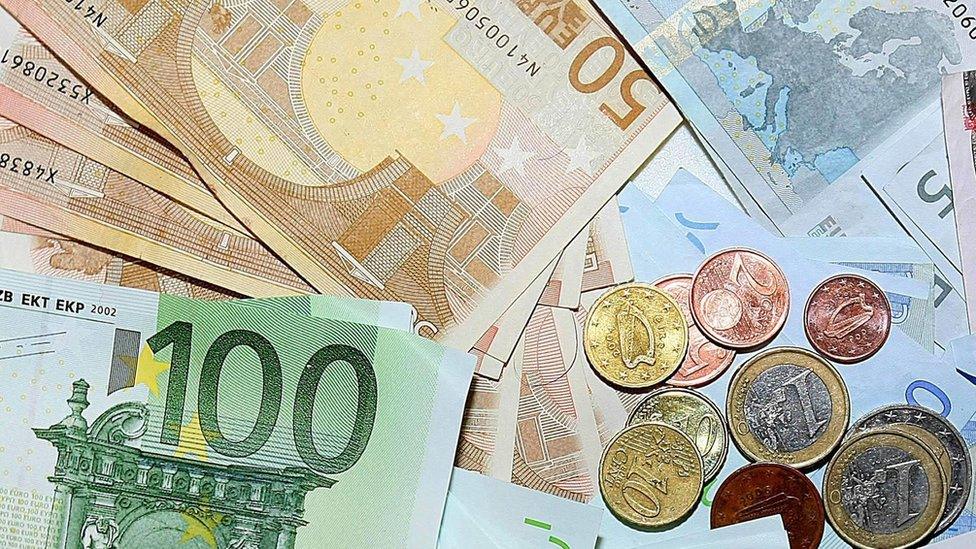 Euro banknotes and coins