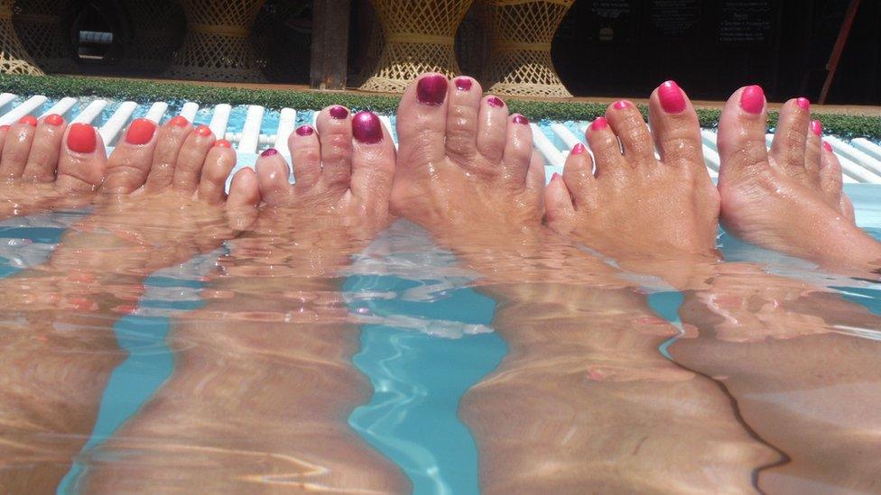 Feet in a pool