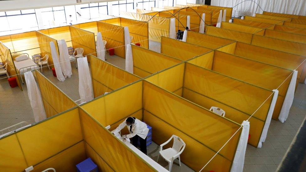 A medical staff member works at the yet to be used field hospital build to treat a large number of patients due to the spread of the coronavirus disease (COVID-19), at the Aga Khan University Hospital in Nairobi